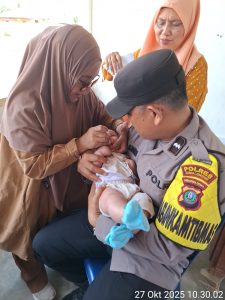 Bhabinkamtibmas Aipda H. Sinaga Dampingi Kegiatan “PENARI” di Bosar Maligas: Dukung Imunisasi Balita Demi Generasi Sehat